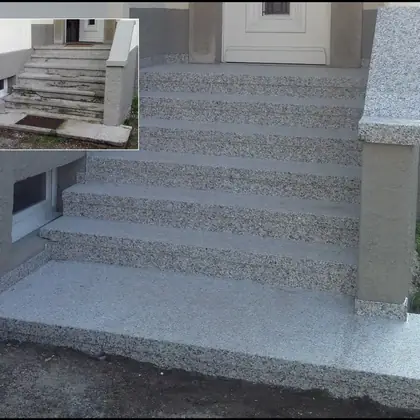 Sechsstufige Außentreppe nach der Sanierung: hellgrauer Granit mit Podest und verkleidetem Pfeiler – InnoStone Treppensanierung