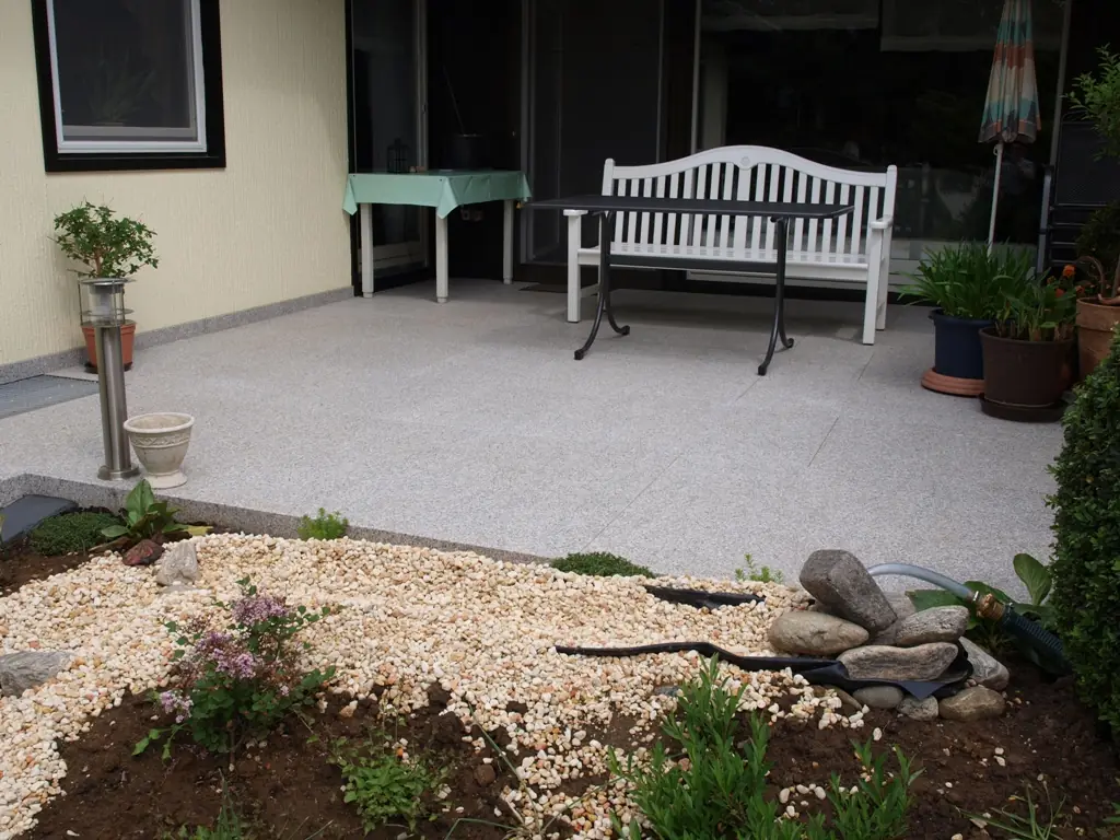 Balkone & Terrassen: sanierte Treppe mit InnoStone Naturstein – Treppensanierung Mainfranken